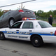 Illustration for article titled Watch A Police Car Make Love To A Camry, Now With Video!